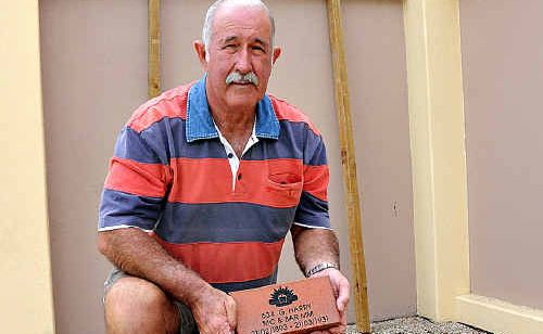 Remembered: GYMPIE RSL’s Ivan Friske with some of the tiles going into the new walls in Memorial Lane. Remembered: GYMPIE RSL’s Ivan Friske with some of the tiles going into the new walls in Memorial Lane.